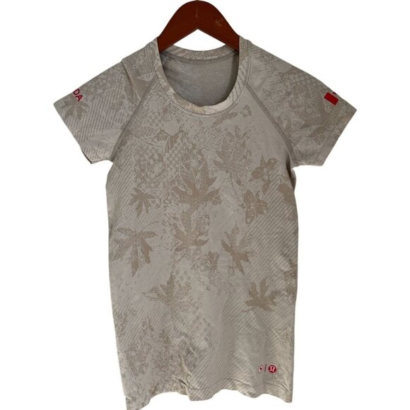 Lululemon Tops - Lululemon Womens Beige Canada Maple Leaf Short Sleeve Performance Shirt